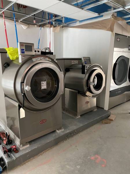 New Milnor Commercial Washers and Dryers for a Hotel Laundry Room